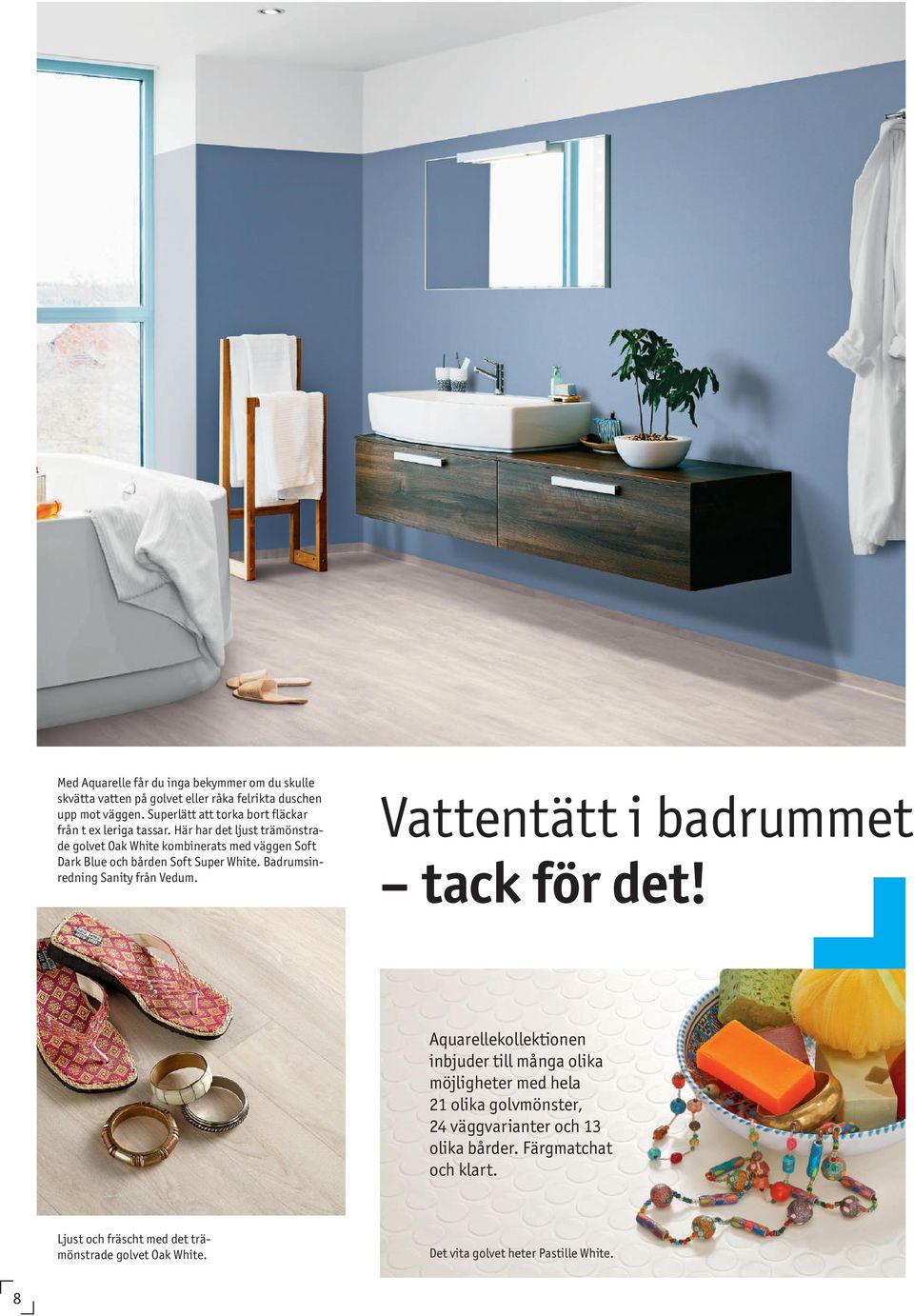 Här har det ljust trämönstrade golvet Oak White kombinerats med väggen Soft Dark Blue och bården Soft Super White. Badrumsinredning Sanity från Vedum.