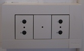 Efter ordinarie kontorstid används tryckknapp i korridor för att aktivera möjlighet till belysning igen.