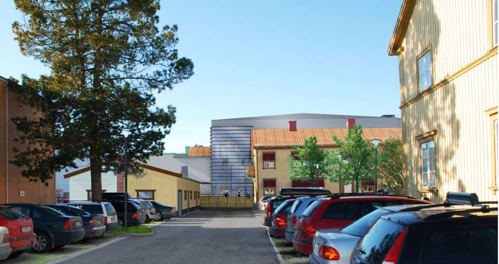 6(11) Gårdsbyggnaden En ny gårdsbyggnad planeras innehålla nedfart till källargarage, cykelförråd, avfallsutrymme och även ett möbelförråd för den något uppbyggda uteplatsen.