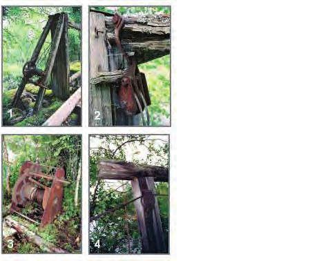 BILD 13. Få bevarade och mycket unika exempel på teknisk lösning vid justering av bjälkdämmen. Spelanordning vid sidan av stolparna, tillverkade av trä, med taljor genom vilka vajrar löper.