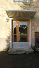 Landsförsamlingen och staden Stockslycke (42) Beskrivning av kulturmiljön Öppet och fritt placerade flerbostadshus i rött eller gult tegel vid stora grönytor med en liten centrumanläggning.