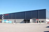 Yta: 5 200 m² lager med 240 m² kontor och personalutrymmen. Byggstart januari 2011 Byggkostnad ca 60 mkr Byggmånader 6 Entr.