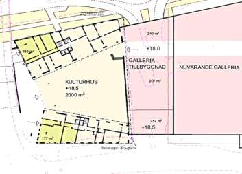 Mellan bostadshusen uppför AB Borätt ett kulturhus/bibliotek i två våningar med entré mot Borgarfjordsgatan och