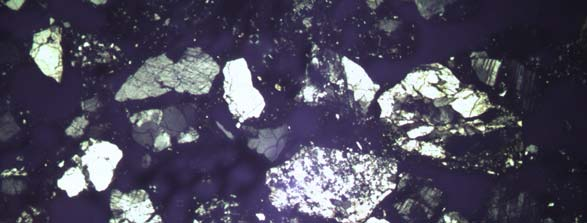 Figur 58. Mikroskopfoto av godset i F620 (TS2). Figur 59.