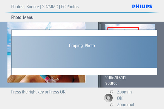 (OK button) för tillgång till foto meny (Photo menu). 4 Använd zoom + knappen för att reducera den beskuren ramen.