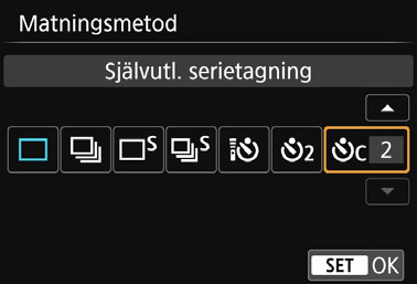 j Använda självutlösaren 114 1 2 Tryck på <YQi>. [Matningsmetod] visas. Välj självutlösare. Tryck på knapparna <Y> <Z> och välj självutlösaren. Tryck sedan på <0>.