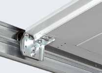 Torsionsfjäderteknik med integrerad fjäderbrottssäkring Hörmann-patent Hörmann takskjutportar med torsionsfjädrar på båda sidor