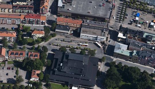bostäder, butiker och parkering på