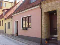 INGRID 7 från SV fastighet: INGRID 8. adress: Teatergränd 7. ålder: 1800-tal. Ombyggt 1916, 1955. Henrik Nilsson (1916). Gråmålad cementputs.
