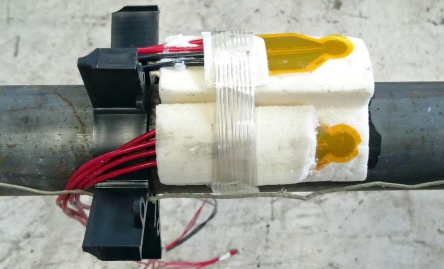 1 Gjutning av sensorer för mätning av värmekonduktiviteten De fem fjärvärmerören som tillverkades av PowerPipe AB i Göteborg utrustades med speciella så kallade TPS sensorer (Transient plane source)