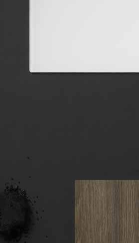 SKARPT & SOFISTIKERAT Skarpa kontraster mellan vitt och svart, där grått och trä ger balans och ett mer sofistikerat uttryck.