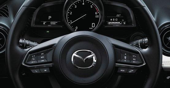 E N S A N N HEAD-UP DISPLAY MED VÄGSKYLTSAVLÄSNING K Ö R U P P L E V E L S E Mazda