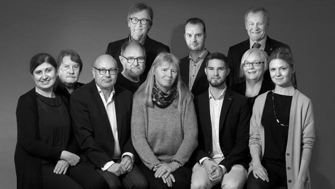 Ledamöter och suppleanter stående från vänster: Rustan Hälleby, Gunnar Ekeroth och Lars Johansson.