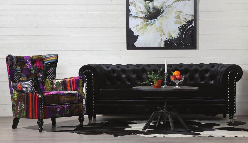 mellan Chesterfield och Clubmodell. Modellen finns i vintageläder eller lin/bomull.