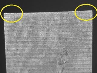 Figur 11. Visar eggskärpa, t.v. slö kant medan t.h. vassare kant. R= 25 µm Figur 12. Kantspetsen på skärverktyget t.h. Figur 13.