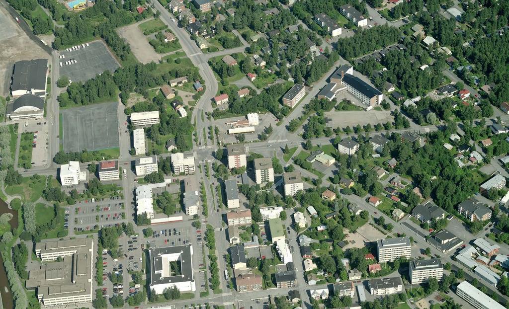 Flygbild från söder, var planområdets närmiljö syns mera omfattande. (Blom DeskTop 2011).