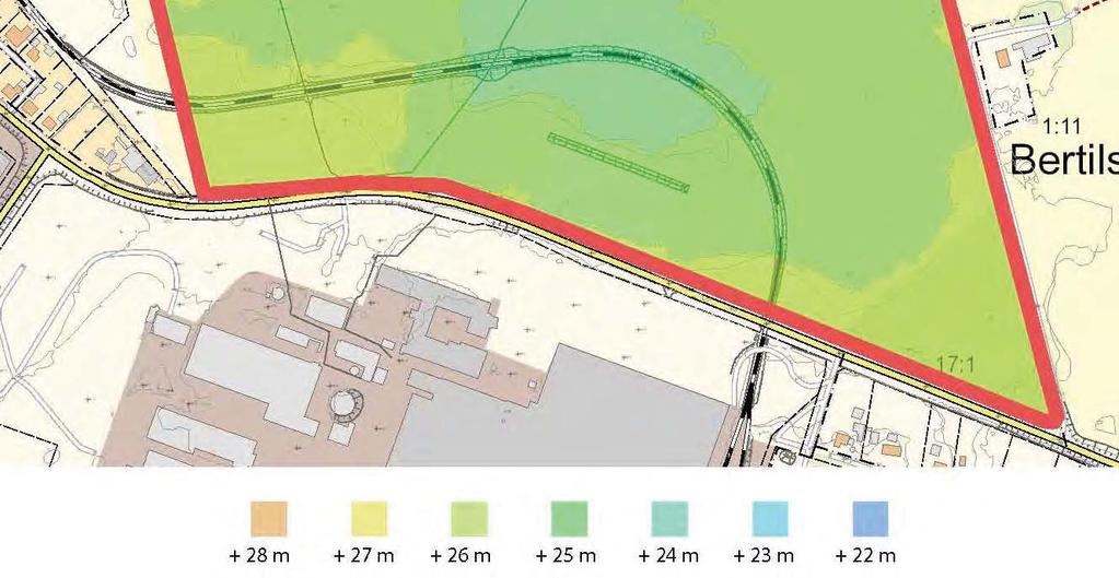Övriga delar utgörs av en befintlig parkeringsplats, en grusväg, trädplantering och gräsbevuxen