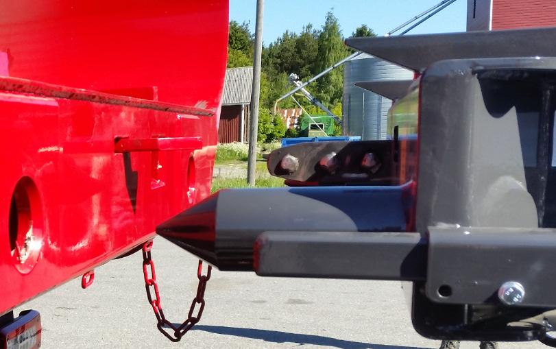 Framdelen på släpvagnsflakets kätting Smörj framdelen på släpvagnsflakets kätting med