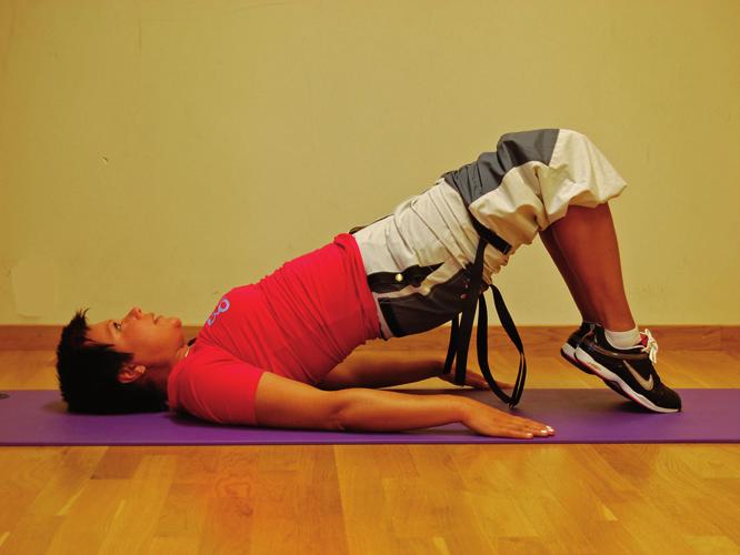 18. Höftlyft med intensitets/tyngdförändringar Ligg ner i ryggläge.