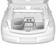 Lastningsinformation Tunga föremål i bagagerummet ska placeras mot ryggstöden. Kontrollera att ryggstöden sitter säkert fast, dvs. de röda markeringarna på sidan nära frigöringsspaken ska inte synas.