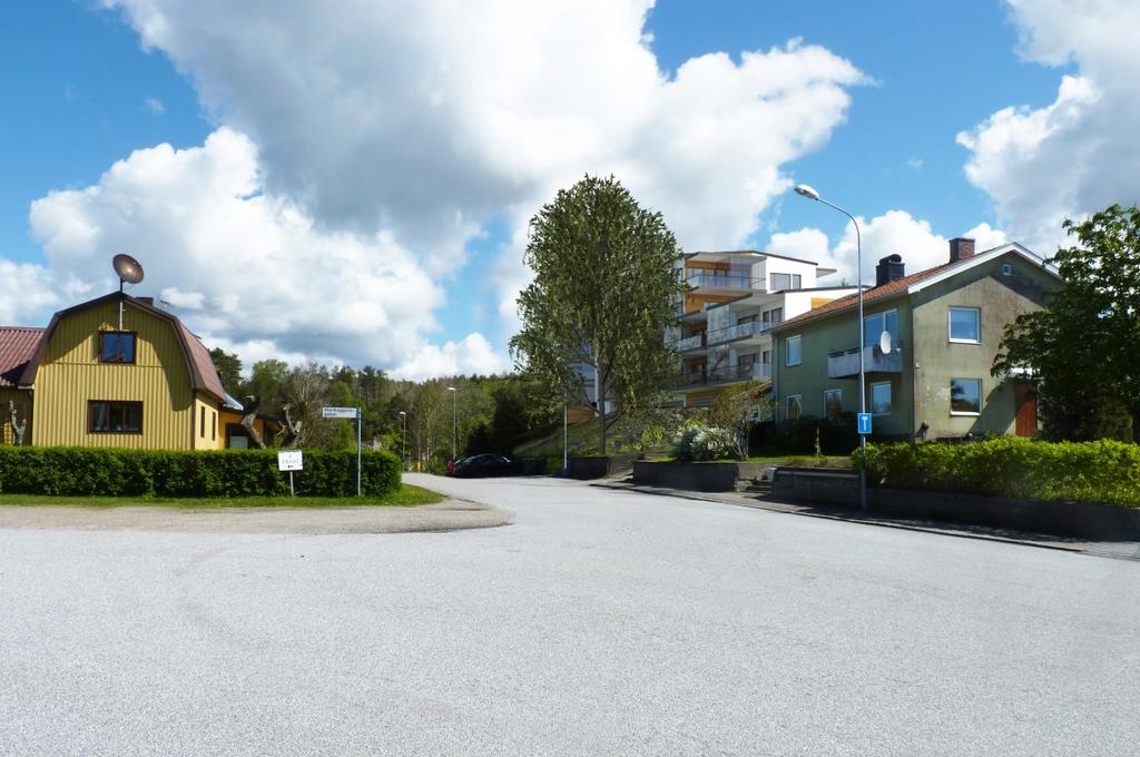 (Befintlig tvärställd parkering på Mellbyvägen, som syns i montaget
