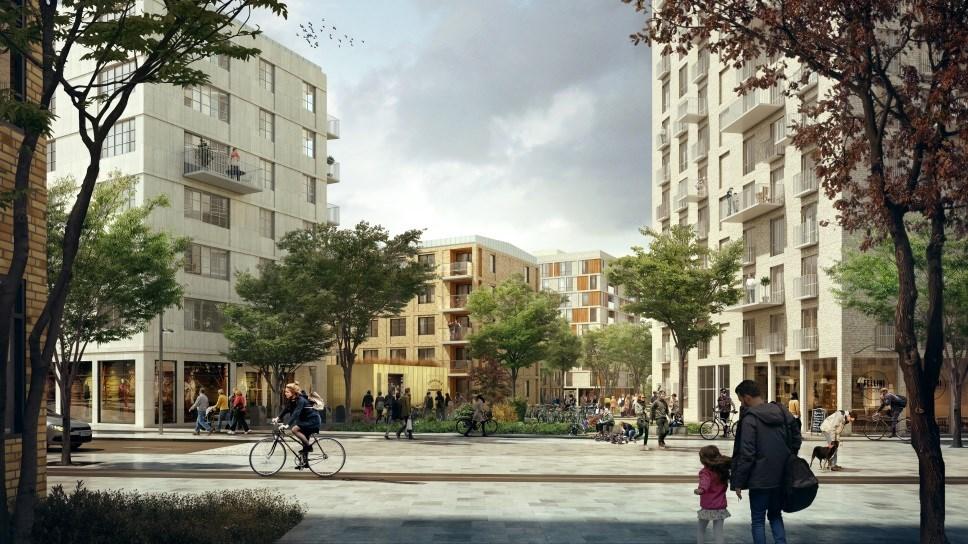Vy från sydost längs Kabelverksgatan, söder om planområdet. (AIX Arkitekter) Det höga huset trappas av för att skapa bättre vindklimat och ge ett slankare intryck.