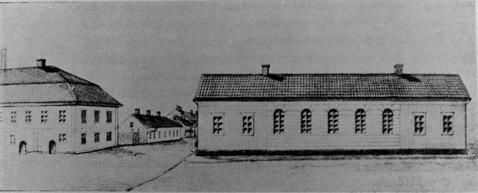 BIBLIOTEKET I LANCASTERSKOLAN Lancasterskolan i hörnet Åsgatan/Kristinegatan Söndagen den 3 mars 1861 öppnades det nya allmänna lånebiblioteket ( stadsbiblioteket ) i f. d. Lancasterskolan i hörnet av Åsgatan och Kristinegatan.