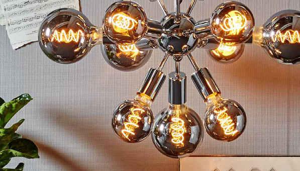 Heavy Smoke spiral filament are decorative, dimmable lamps in a dark toned glass, with 2100K and with spiral filament in a retro look.