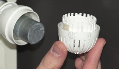 Turn the knob to position 3 and remove it by pulling it forward. 3a. Knob opening limit: Partial opening of the thermostatic head can be achieved by inserting the limiter as shown below.