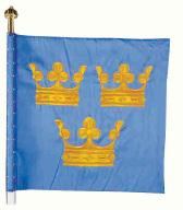 Regentens kommandotecken Teckenbeskrivning På blå duk lilla riksvapnet; tre öppna gula kronor ställda två och en. Kommandotecknet är ritat av Brita Grep och handbroderat i Kedjas atelje, Heraldica.