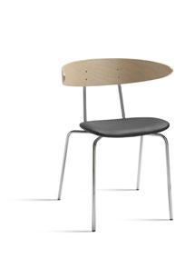 Chair with frame in tubular steel in standard (black, white or silver), chrome, or. Seat and back in compression moulded birch veneer, oak veneer or stain.