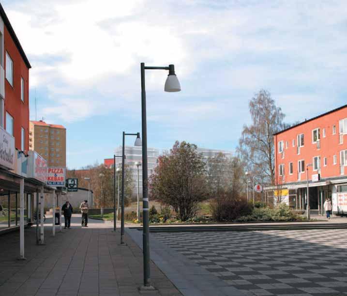 Vy från Dr Fries torg där de två nya byggnaderna syns i fonden Boendesynpunkter från vandringarna; Syster Estrid gata två nya punkthus 51 Programförslag Illustration White arkitekter Utsikten från de