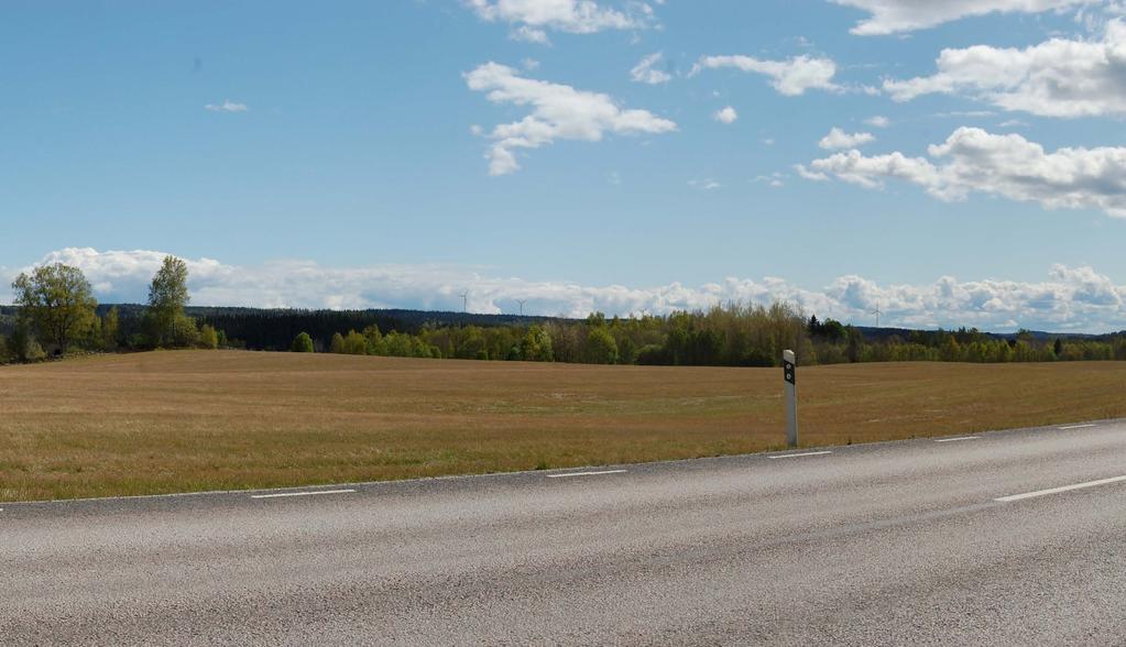 FOTOPUNKT 1A GIMMENE Fotomontage från Gimmene mot sydost. En uppställning med 19 vindkraftverk, navhöjd 124 m och rotordiameter 101 m. Totalhöjd 175 m.
