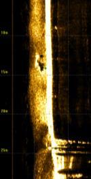 702944 11.951856 Metallrör. Dimension 4-5 m exponerat. 0,1 m diam.