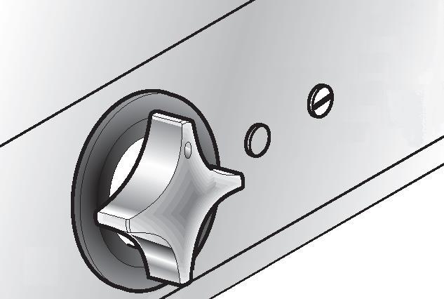 Bryt strömmen till apparaten 2. Skruva loss spårskruven till höger om termostatreglaget. 3.