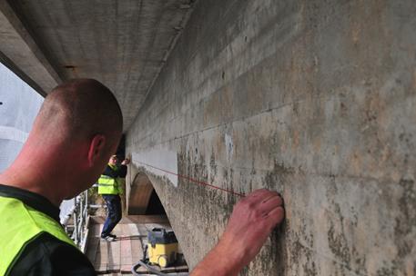 Prior to drilling the holes of 22 mm diameter to install Hilti bolts to fasten temporary steel anchors, reinforcement detection was conducted in order to avoid drilling into the