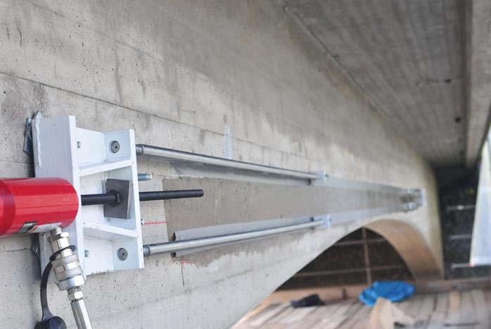 Application of primer on the surface In order to enhance the bond between the laminate and the concrete, according to the manufacturer s recommendation, a primer was applied to the surface of the