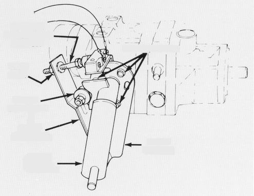 Justera gaspedalens friktionshjul. Lossa de två muttrarna som fäster gaspedalaxeln på pedalens högra sida (fig. 59).