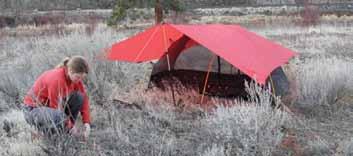 5 Adjust the Tarp pitch with the line runners on the guy lines, and/or by adjusting the placemt of the pegs.