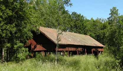 Gäddeholm 2:1. Byggnad 4 (torklada 3) Figur 14. Torklada från söder. Nuvarande funktion: Garage /upplag. Ursprunglig funktion: Torklada för tegel. Grund: Sten.