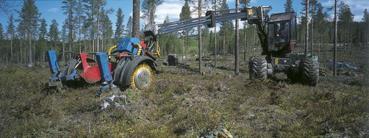 Figur NF30 Kranspetsmonterat aggregat för markberedning och sådd Humax 2 4. Foto Holmen Skog AB.