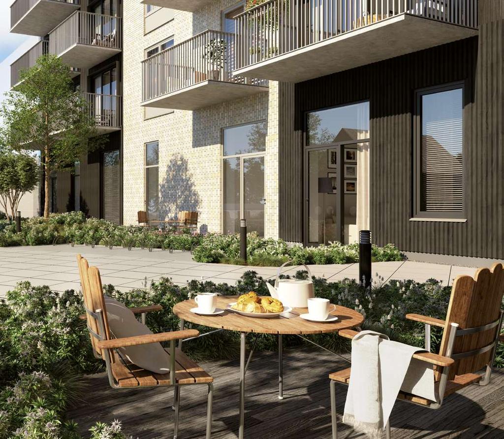 Välkommen upp till den gemensamma takterrassen med underbar utsikt och växthus för såväl odling som