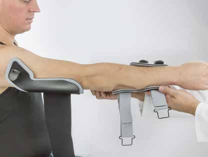Bruksanvisning Applicera ortosen på armbågen Placera ortosen på patientens arm underifrån.