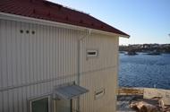 Byggnadsarea 840m2 Bruttovolym 11800m3 Nybyggnad av småhus/radhus Ringberget i Kungshamn kv Ringen Erlandssons Bygg har byggt hus i Kungshamn och avbildade väggar är