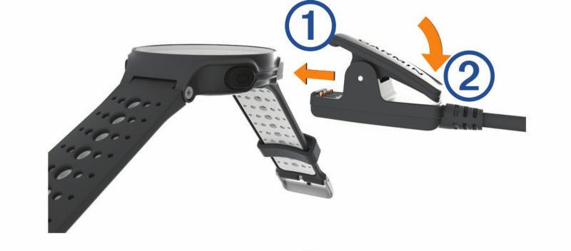 1 Passa in laddarens stift mot kontakterna på enhetens baksida och anslut laddningsfästet À ordentligt på enheten. 2 Anslut USB-kabeln till en USB-laddningsport. 3 Ladda enheten helt.