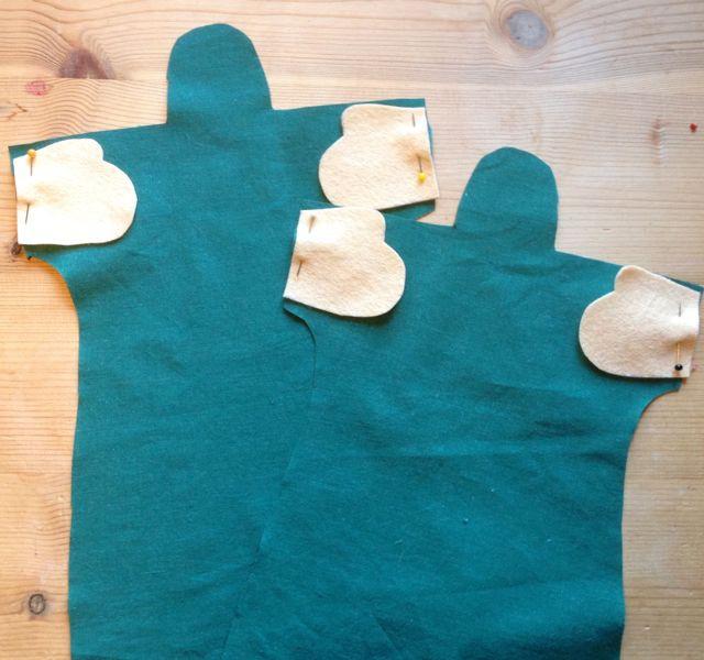1 2 Fyra händer behövs. Klipp efter mallen Klipp ut två huvuden.
