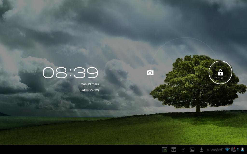 Grundläggande Låsa upp din ASUS Transformer Pad Tryck på och dra låsikonen ut ur cirkeln till