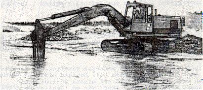 Maskinens skopa fylls med material varefter den försiktigt förs ner genom vattnet till bestämd plats pä bo tten.