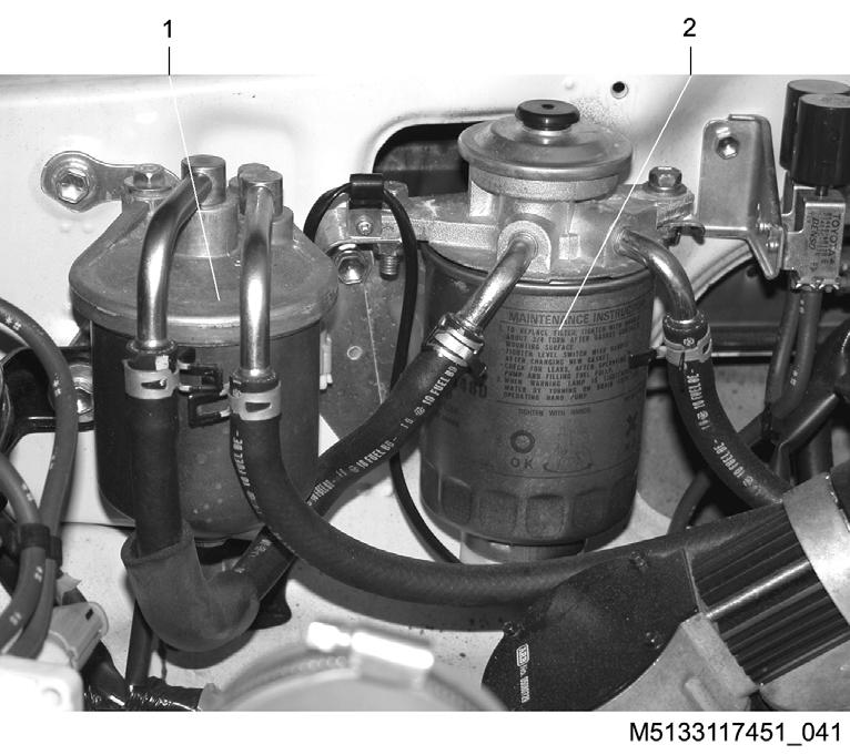 Vård Lastterrängbil 1T, Flak 2M, 4x4 Byte av filter 1 Koppla isär elkontakten till