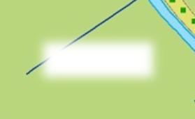av dammen i inloppet av vattendraget.